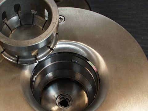Quick-change tooling housing for turbocharger welding